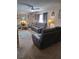Relax in this inviting living room featuring plush seating, soft lighting, and stylish decor at 11301 Huggins St, Leesburg, FL 34788