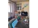 Cozy screened-in patio with comfortable seating and charming decor, perfect for relaxing at 11301 Huggins St, Leesburg, FL 34788