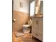 Bathroom featuring tile floors, toilet, and vanity with white cabinets at 14545 Sw 34Th Terrace Rd, Ocala, FL 34473