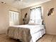 Bedroom featuring neutral paint, a ceiling fan, and a double closet at 14545 Sw 34Th Terrace Rd, Ocala, FL 34473