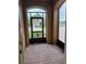 Screened-in lanai with brick flooring and views of a golf course at 803 Jasmine Creek Rd, Kissimmee, FL 34759