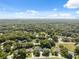 Aerial view of a quiet, wooded residential neighborhood at 8929 Sw 196Th Ct, Dunnellon, FL 34432