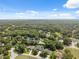 Aerial view of a quiet, wooded residential neighborhood at 8929 Sw 196Th Ct, Dunnellon, FL 34432