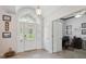 Bright foyer features a decorative leaded-glass door and sidelights that provide a warm welcome to the home at 8929 Sw 196Th Ct, Dunnellon, FL 34432
