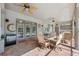 Entertain on the spacious patio, complete with ceiling fans, outdoor bar, and brick flooring at 8929 Sw 196Th Ct, Dunnellon, FL 34432