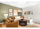 Cozy living room featuring neutral tones, comfortable seating, and modern decor for a relaxing atmosphere at 1125 Red Buckeye Ct, Deland, FL 32720