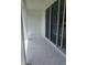 Relaxing balcony features sliding glass doors for easy indoor-outdoor living at 1129 Red Buckeye Ct, Deland, FL 32720