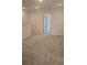 A view of the hallway that includes neutral walls and carpeted floors at 1129 Red Buckeye Ct, Deland, FL 32720
