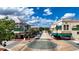 Downtown street with shops, Indiana Ave sign, and a roundabout under a blue sky at 1133 Red Buckeye Ct, Deland, FL 32720