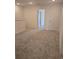 Well-lit upstairs loft space with carpet flooring and neutral paint at 1133 Red Buckeye Ct, Deland, FL 32720