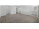Inviting main bedroom shows neutral carpet and access to the bath and walk in closet at 1133 Red Buckeye Ct, Deland, FL 32720