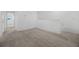Neutral carpet located in the upstairs loft area of the home at 1133 Red Buckeye Ct, Deland, FL 32720