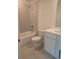 Bathroom featuring a tub/shower combo with tiled walls at 1145 Red Buckeye Ct, Deland, FL 32720