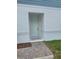 Home entryway featuring a light blue front door at 1145 Red Buckeye Ct, Deland, FL 32720