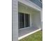 Covered patio featuring sliding glass doors at 1145 Red Buckeye Ct, Deland, FL 32720