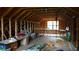 Unfinished attic space offering plenty of storage or conversion possibilities at 1315 Veech Rd, Leesburg, FL 34748