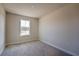 Bright bedroom with a window letting in natural light at 572 Highfalls Ave, Debary, FL 32713