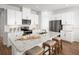 Modern kitchen with an island, a breakfast bar, and stainless steel appliances at 6501 Domizio Dr, Winter Haven, FL 33884