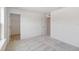 Neutral bedroom with plush carpeting, an open closet, and ample natural light at 5281 Luisa Ct, St Cloud, FL 34771