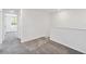 Comfortable carpeted room features neutral paint, a wide hall, and a sunlit window at 5285 Luisa Ct, St Cloud, FL 34771