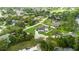 Aerial shot of home with a large lawn and inground pool at 1148 Rosetta Dr, Deltona, FL 32725