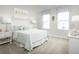 Charming bedroom with blue accents, comfortable bedding, and decorative wall art at 1203 Port Blue Way, Lady Lake, FL 32159