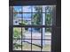 Outdoor view through a window of a water view with an RV parked on the property at 2200 S Palmetto Ave # E050, South Daytona, FL 32119