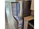 Modern stainless steel refrigerator with open doors in a bright kitchen at 2200 S Palmetto Ave # E050, South Daytona, FL 32119