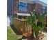 Private patio area with wooden fence offering a secluded outdoor space at 2200 S Palmetto Ave # E050, South Daytona, FL 32119