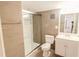 Modern bathroom with tiled shower and white vanity at 423 E Kaley St, Orlando, FL 32806