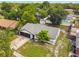 Bird's eye view showing the home's layout, two car garage, and surrounding landscape at 7289 Lake Floy Cir, Orlando, FL 32819
