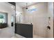Walk-in shower with glass enclosure and modern fixtures and beautiful tile work at 764 Mystic Gardens Dr, Apopka, FL 32703