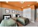 bedroom features two beds, decorative pillows, overhead lighting and carpeted floor at 847 Emerald Grove Dr, Apopka, FL 32703