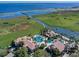 Aerial view of Bellalago community amenities including multiple pools, clubhouse, lake access, and lush green spaces at 3612 Northwoods Dr, Kissimmee, FL 34746