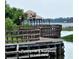 Picturesque fishing pier and boardwalk on Lake Toho offer residents a serene spot to relax and enjoy waterfront activities at 3612 Northwoods Dr, Kissimmee, FL 34746