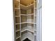 Walk-in pantry with adjustable shelving, providing ample storage space at 3612 Northwoods Dr, Kissimmee, FL 34746