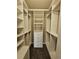 Well-organized walk-in closet offering ample shelving and drawer space at 3612 Northwoods Dr, Kissimmee, FL 34746
