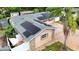 Aerial view of home featuring solar panels, umbrella patio, and brick pathway at 774 Hendrix Ave, Orlando, FL 32825