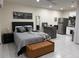 Studio bedroom featuring tile floors, kitchenette, and modern appliances at 774 Hendrix Ave, Orlando, FL 32825