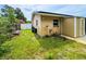 Exterior view of the home's backyard and garden area at 774 Hendrix Ave, Orlando, FL 32825
