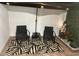 Well-lit patio features an outdoor rug, table, and fountain feature at 774 Hendrix Ave, Orlando, FL 32825