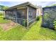 A screened-in porch offers a comfortable outdoor space, perfect for enjoying the fresh air at 774 Hendrix Ave, Orlando, FL 32825