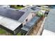 This home has solar panels, an enclosed porch and features a long garden against a wooden fence at 774 Hendrix Ave, Orlando, FL 32825
