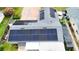 Aerial view of a home featuring newly installed solar panels for enhanced energy efficiency at 774 Hendrix Ave, Orlando, FL 32825