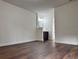 Spacious bedroom featuring hardwood floors, lots of natural light, and a stylish vanity at 3006 S Semoran Blvd # 7, Orlando, FL 32822