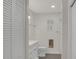 Clean bathroom with modern vanity, tile flooring, and walk-in shower at 3207 Cr 419, Lake Panasoffkee, FL 33538