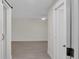 Bright, airy bedroom with light gray floors, white trim, ceiling fan and neutral walls at 3207 Cr 419, Lake Panasoffkee, FL 33538