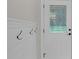 Entryway featuring coat rack, a transom window, and neutral paint at 3207 Cr 419, Lake Panasoffkee, FL 33538