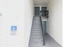 Stairwell leading to apartment units with accessible parking at 4213 S Semoran Blvd # 9, Orlando, FL 32822