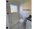 Modern bathroom with a large shower and updated fixtures at 2814 Coventry Ave, Lakeland, FL 33803